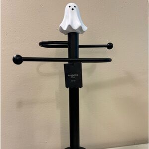 Spooky ghost hand towel holder.